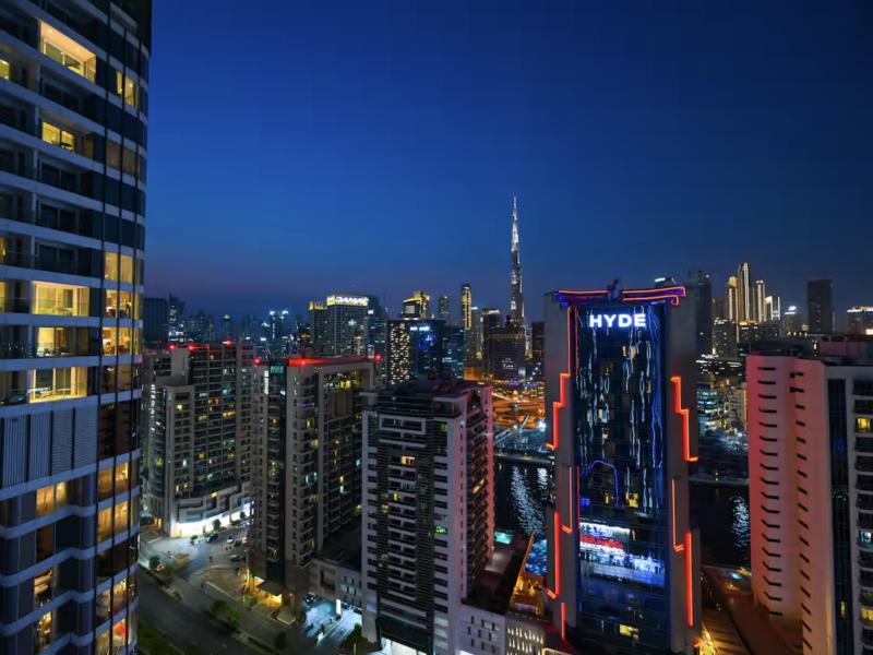 Business Bay skyline at dusk with the Burj Khalifa, seen from the studio
